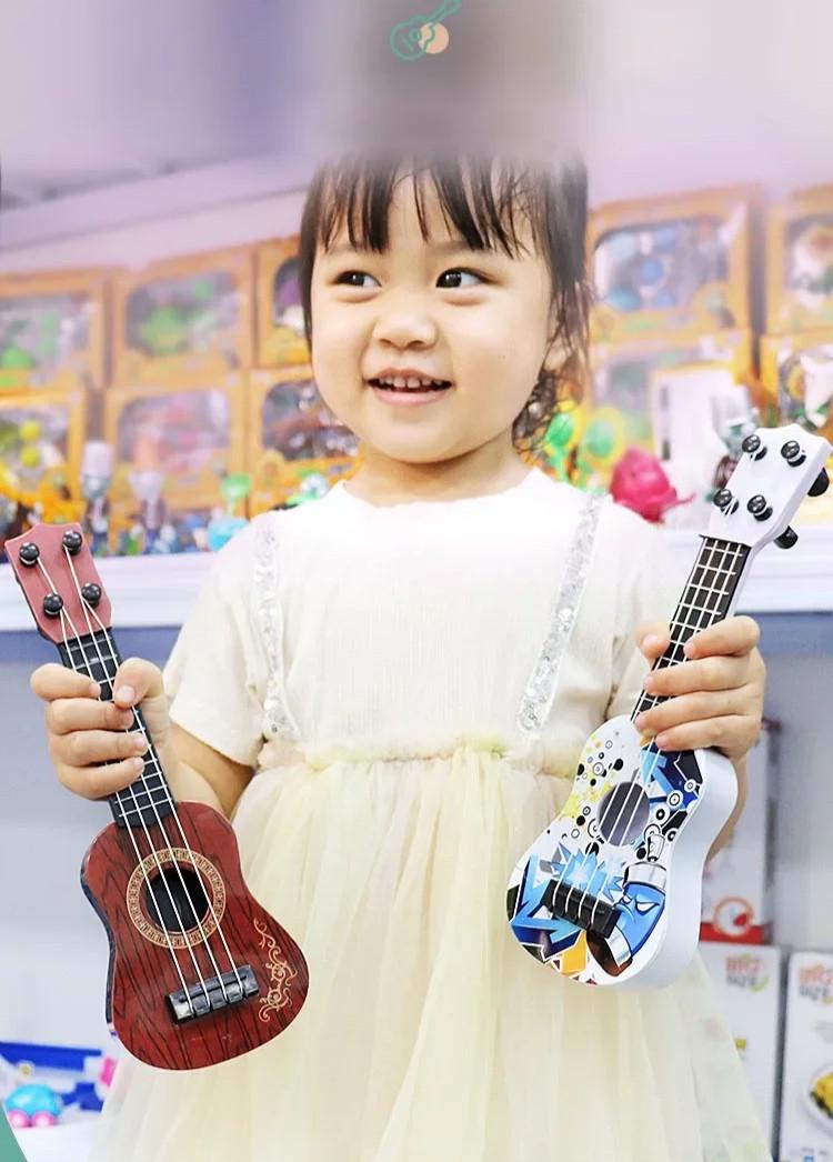 Іграшка маленька дитяча гітара 25 см - фото 6