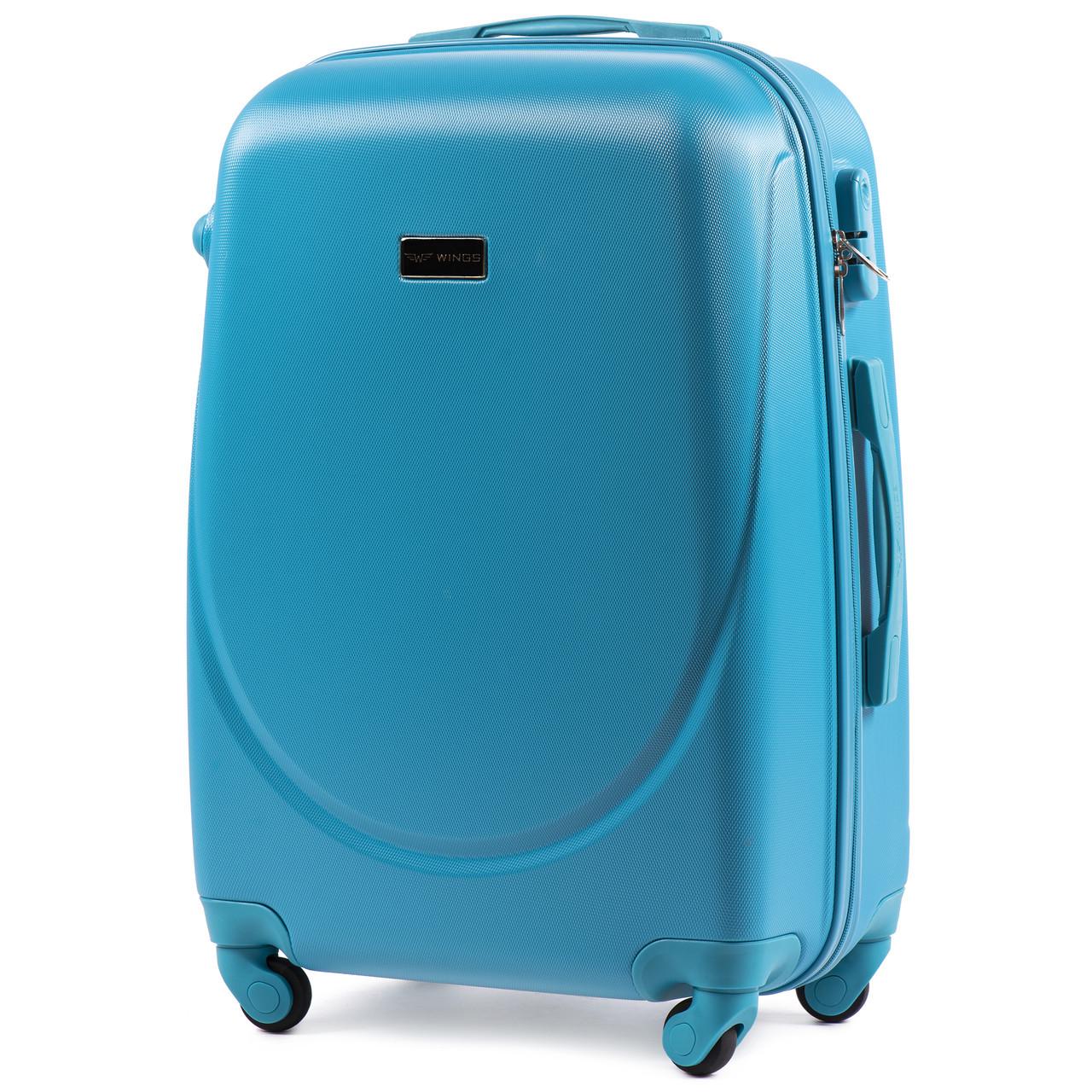 Чемодан Wings K310 средний 65х44х27 см 62 л пластиковый на 4 колесах Голубой Чемодан Wings K310 средний 65х44х27 см 62 л пластиковый на 4 колесах Голубой