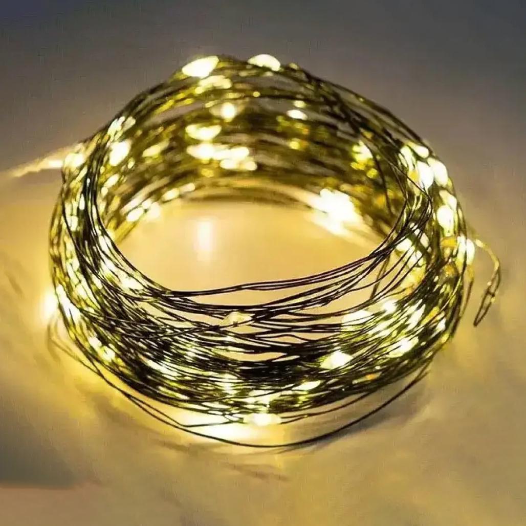 Гирлянда нить Роса 20 м с пульто м 200LED от USB зеленый провод теплый белый