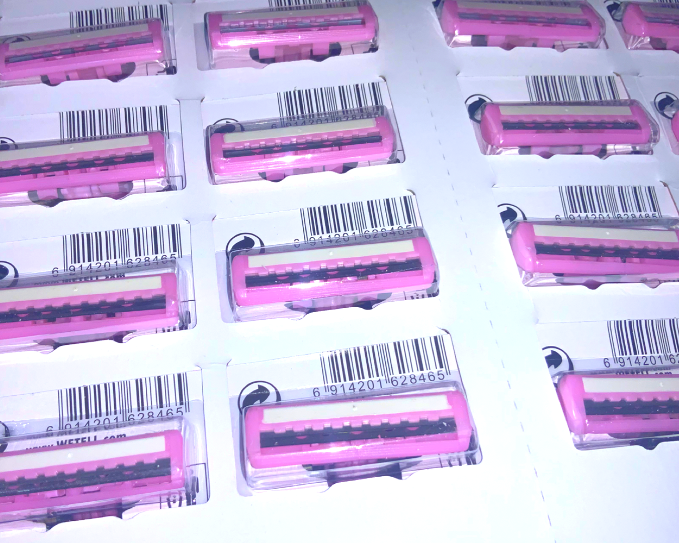 Станки для гоління одноразові WETELL Profissional пластмасові 11 см 24 шт. Рожевий - фото 4