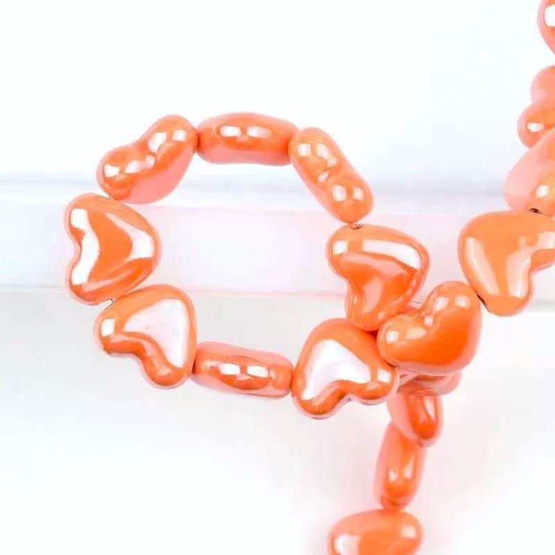 Бусины Сердце керамические горизонт. отверстие 15х13 мм 5 шт. Оранжевый (КБ1315с33)