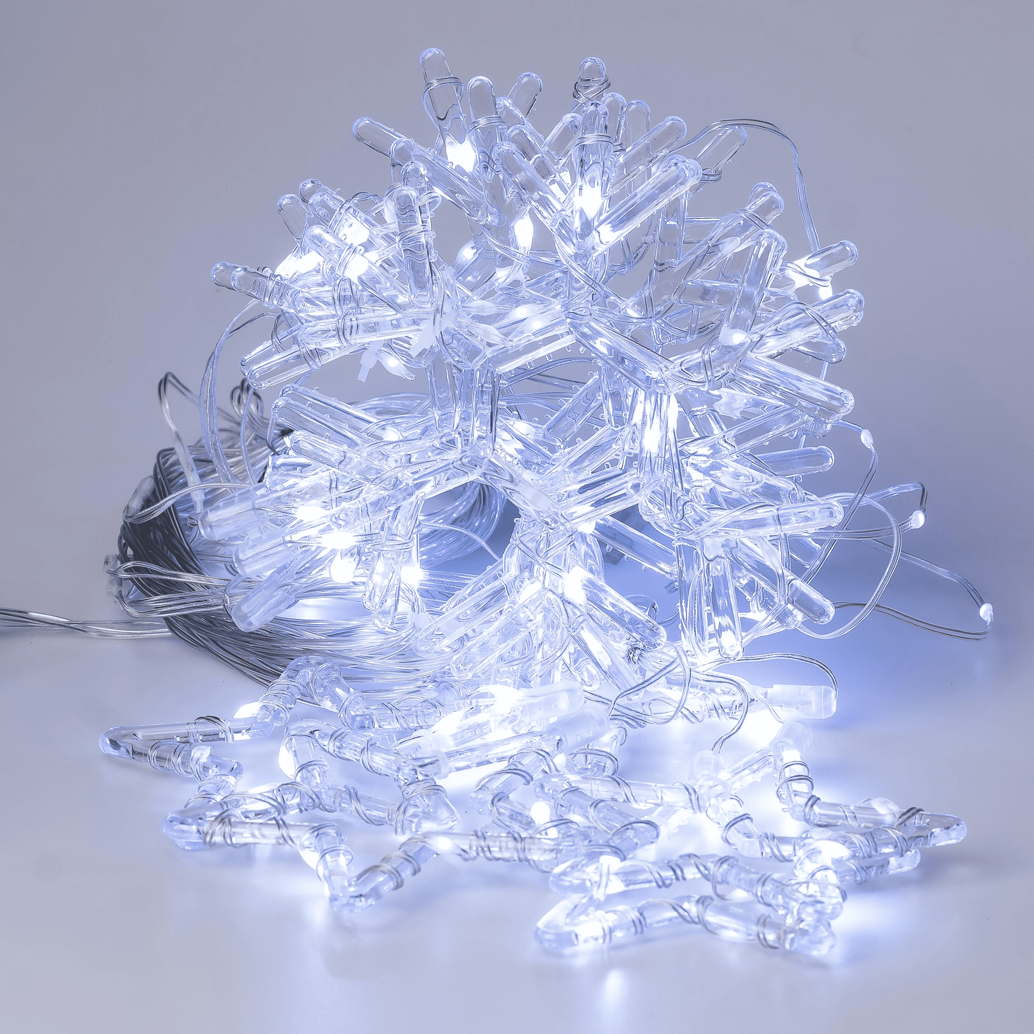 Гірлянда мережева у формі зірочок та сніжинок 12 фігур 3х0,9 м 108 діодів Білий (1733064W)