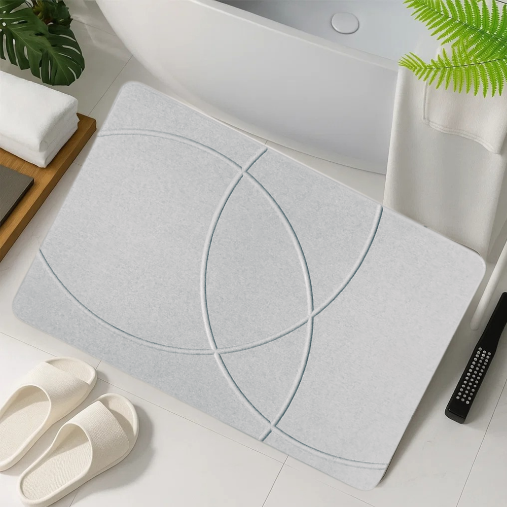 Коврик универсальный для душа и ванной комнаты/кухни/прихожей каменный из диатомита 60х39 см Бело-серый Коврик универсальный для душа и ванной комнаты/кухни/прихожей каменный из диатомита 60х39 см Бело-серый