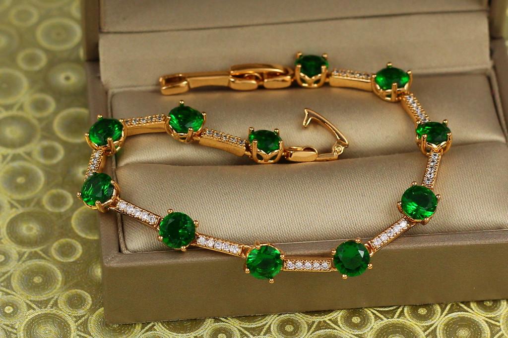 Браслет Xuping Jewelry Хит с зелеными камнями 19,5 см x 5 мм. Золотистый