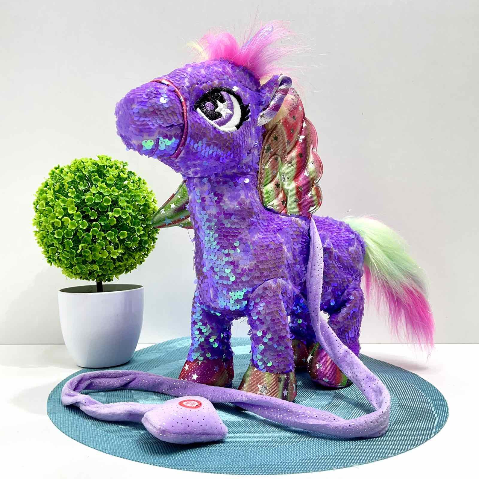 Интерактивная игрушка мягкая Сказочный единорог поводок/звук/свет Фиолетовый (M 6203 I UA) - фото 1 Интерактивная игрушка мягкая Сказочный единорог поводок/звук/свет Фиолетовый (M 6203 I UA) - фото 1