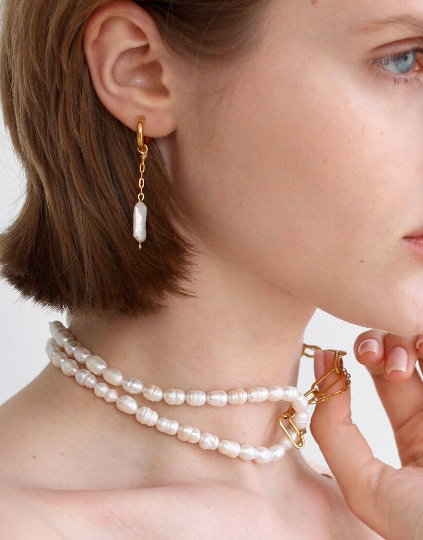 Асиметричні сережки на ланцюжках жіночі NSTONE золоті One size