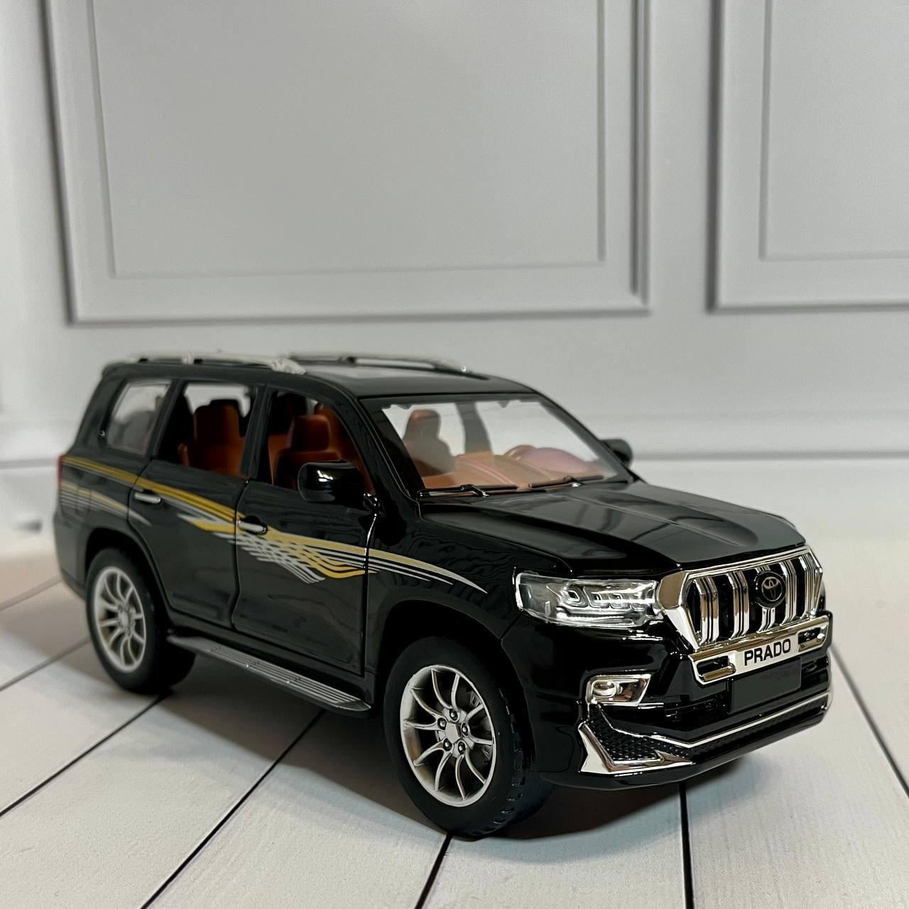 Машинка детская металлическая инерционная Toyota Prado 1:24 звук/свет Черный (G192688-CZ124)