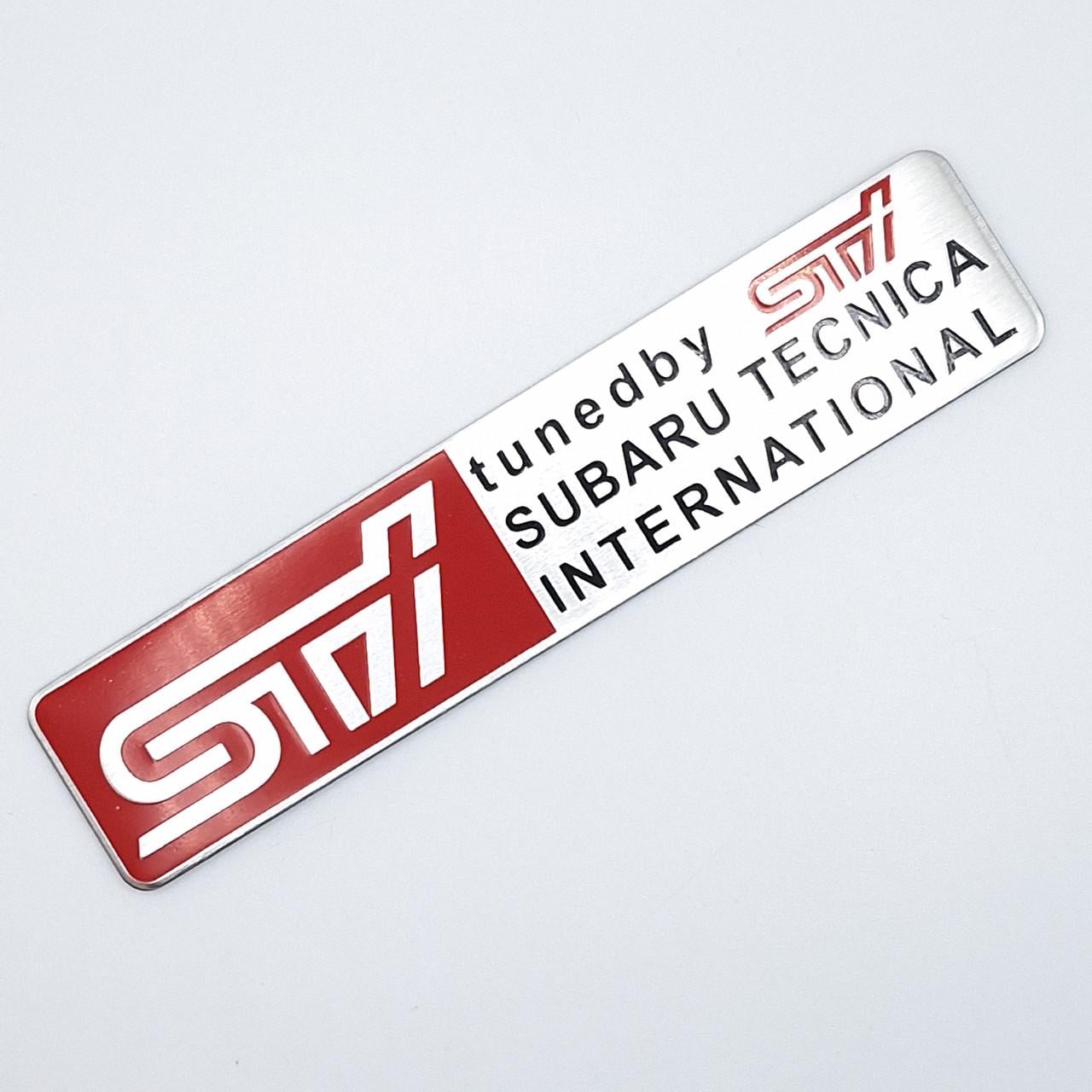 Эмблема алюминиевая SUBARU STI Subaru tecnica international 12х2,6 см (1556413799)