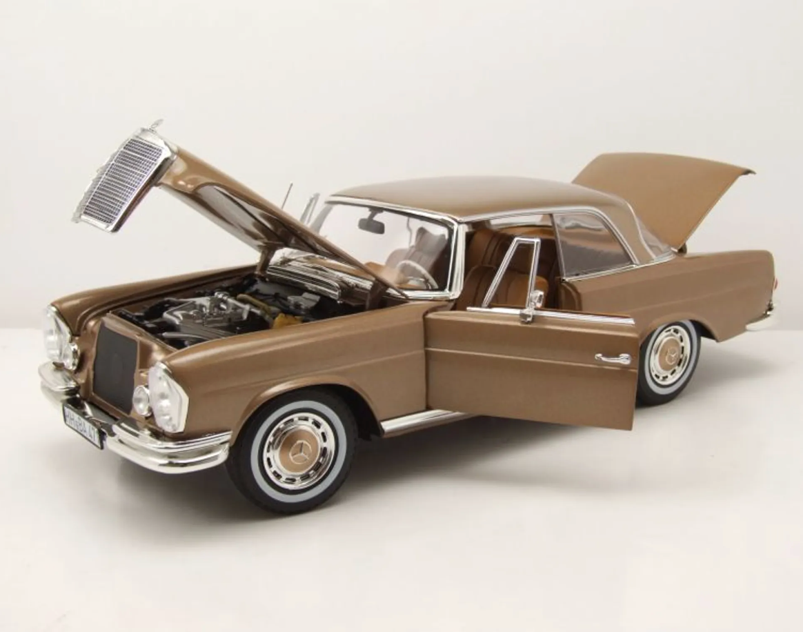 Модель автомобиля Norev 1:18 Mercedes-Benz 250 Coupe SE Gold Metallic (183759) - фото 2 Модель автомобиля Norev 1:18 Mercedes-Benz 250 Coupe SE Gold Metallic (183759) - фото 2