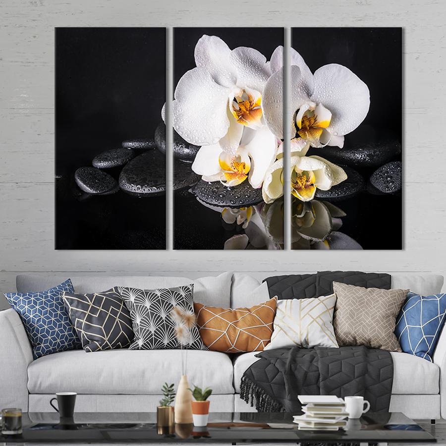 Модульная картина из 3 частей на холсте для интерьера Белые орхидеи на чёрных камнях 128x81 см (68-31) Модульная картина из 3 частей на холсте для интерьера Белые орхидеи на чёрных камнях 128x81 см (68-31)