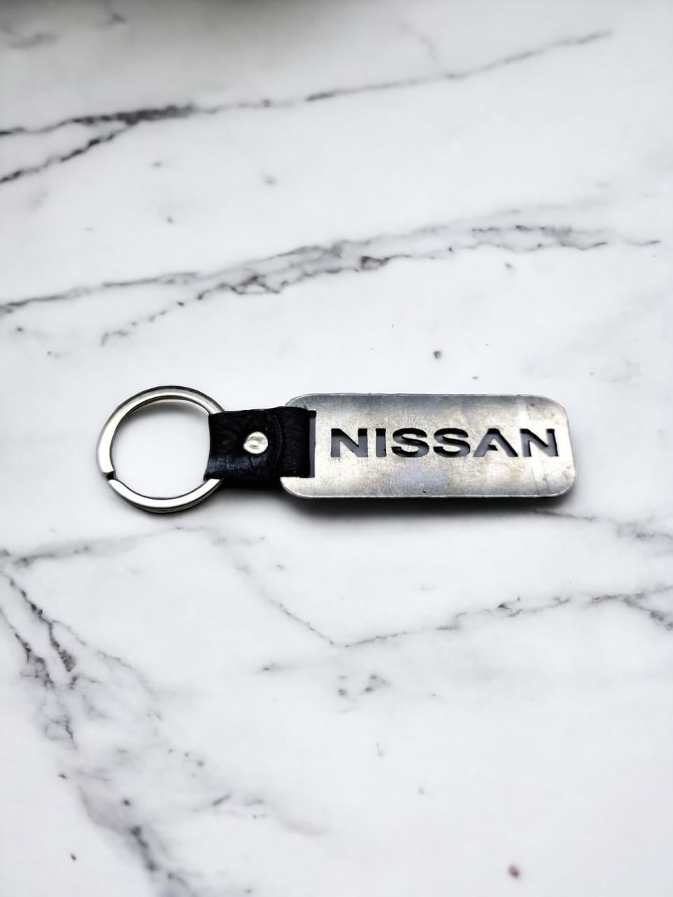 Брелок для автомобиля Nissan металлический (2227179113)