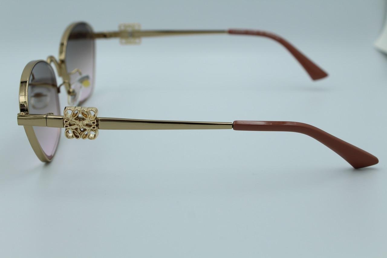 Сонцезахисні окуляри жіночі дизайнерські (19410 col 4) - фото 7 Сонцезахисні окуляри жіночі дизайнерські (19410 col 4) - фото 7