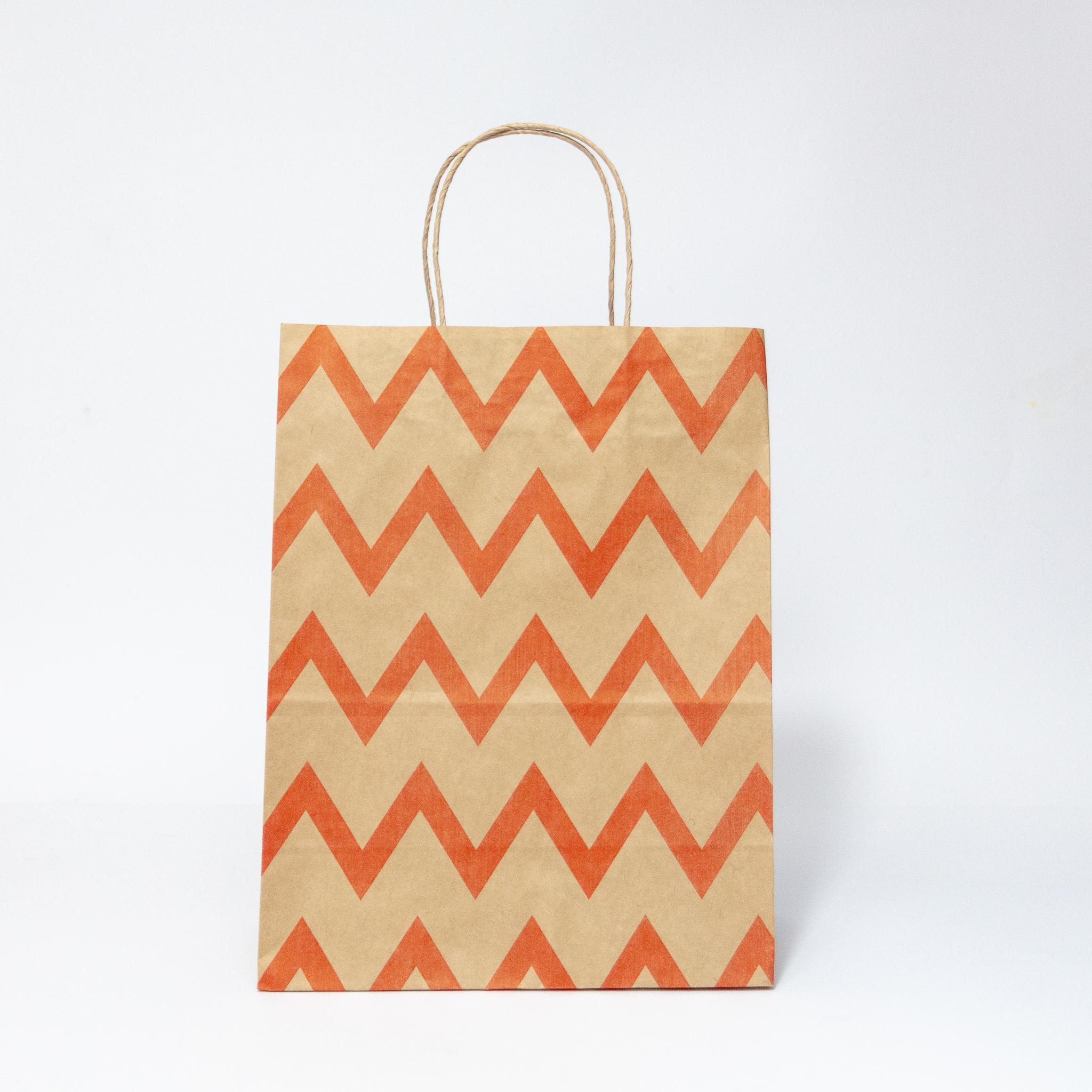 Пакет подарочный с ручками с красным орнаментом зиг-заг 210x120x290 мм 50 шт. Бурый