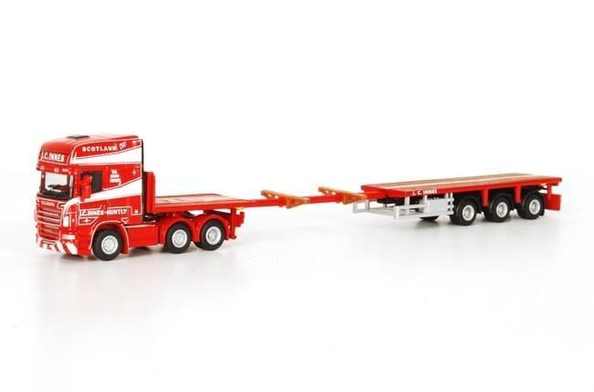 Игрушка Тягач SCANIA с низкорамным прицепом 1:87