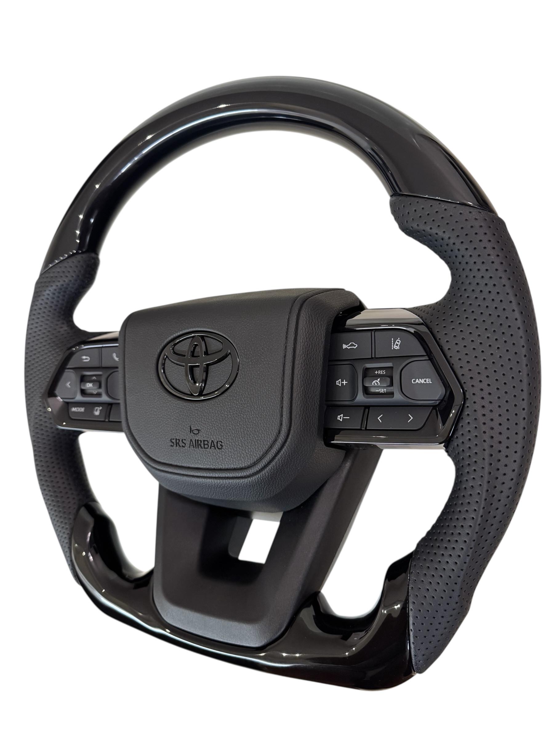 Кермо для Toyota Tundra в сборі рояльний лак зі скошеним низом логотип чорний глянець (29367413) - фото 4 Кермо для Toyota Tundra в сборі рояльний лак зі скошеним низом логотип чорний глянець (29367413) - фото 4