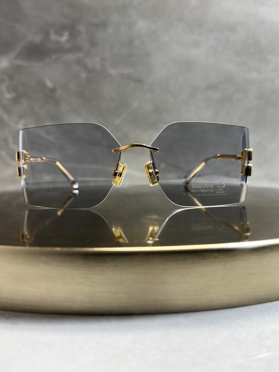 Солнцезащитные очки Miu Miu SMU54Y Gold/Light Grey