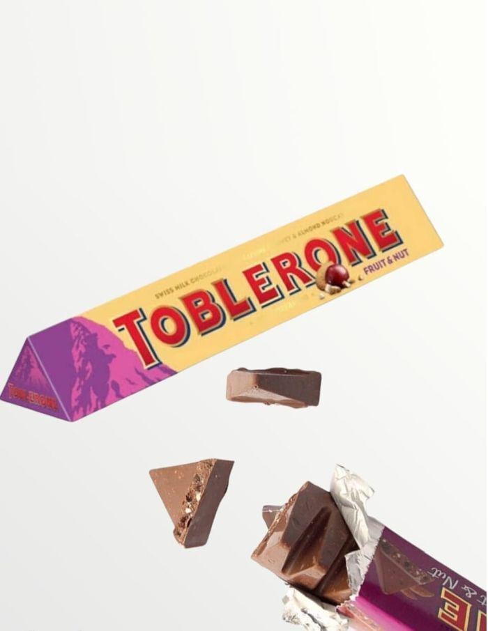 Молочный швейцарский шоколад Toblerone Fruit Nut с изюмом и орехами 100 г - фото 2