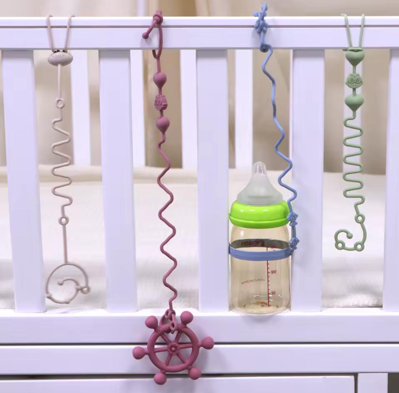 Набор универсальных силиконовых держателей для игрушек 4 шт. и 2 клипсы - фото 8