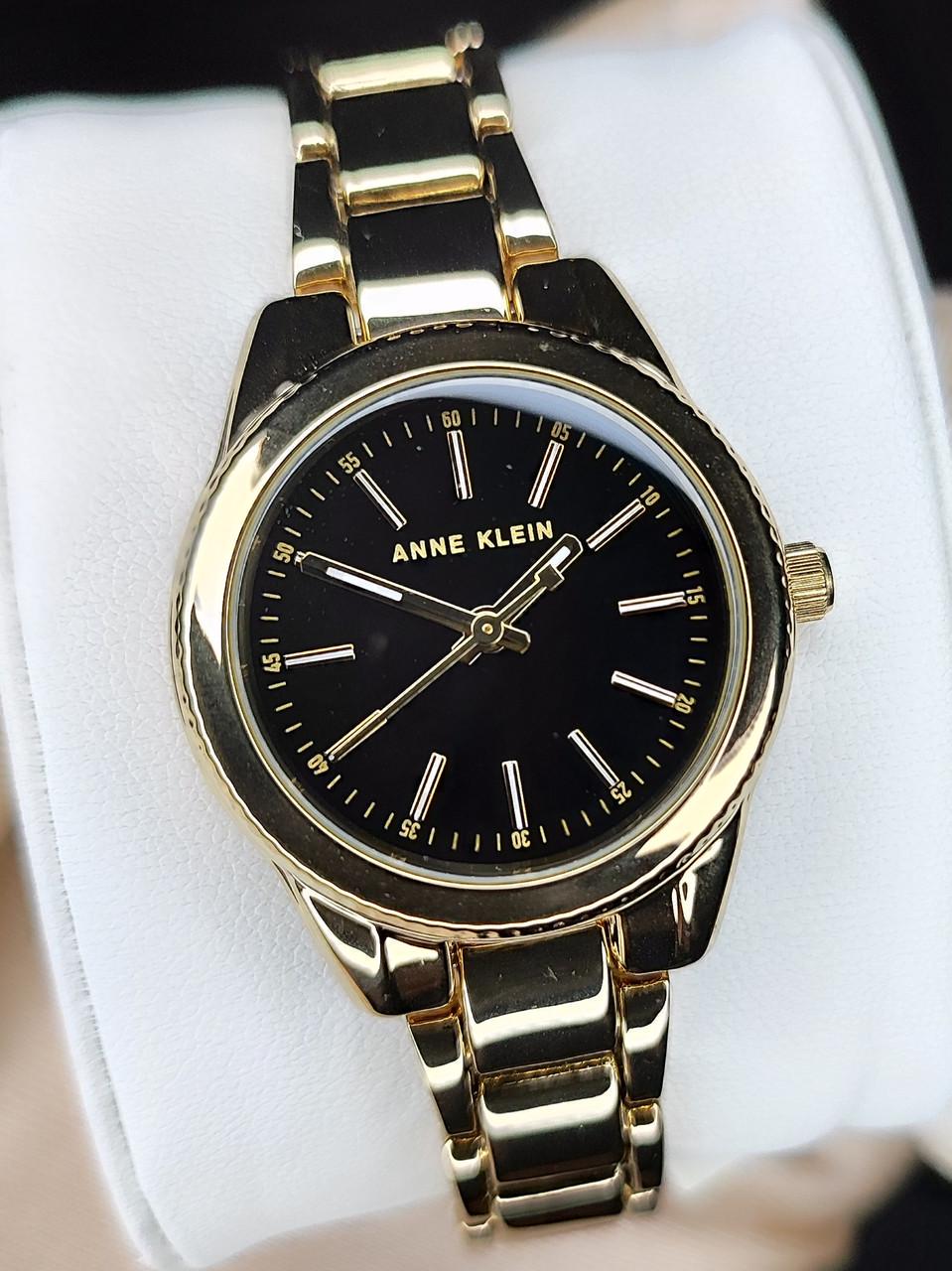 Наручные часы женские Anne Klein AK/5040BKGB с черным циферблатом и золотистым стальным браслетом Наручные часы женские Anne Klein AK/5040BKGB с черным циферблатом и золотистым стальным браслетом