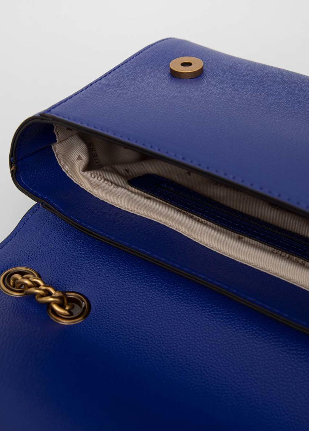 Сумка кросс боди женская из эко кожи GUESS NELL CONVERTIBLE XBODY FLAP HWVB8678210-VIO Синий - фото 4 Сумка кросс боди женская из эко кожи GUESS NELL CONVERTIBLE XBODY FLAP HWVB8678210-VIO Синий - фото 4