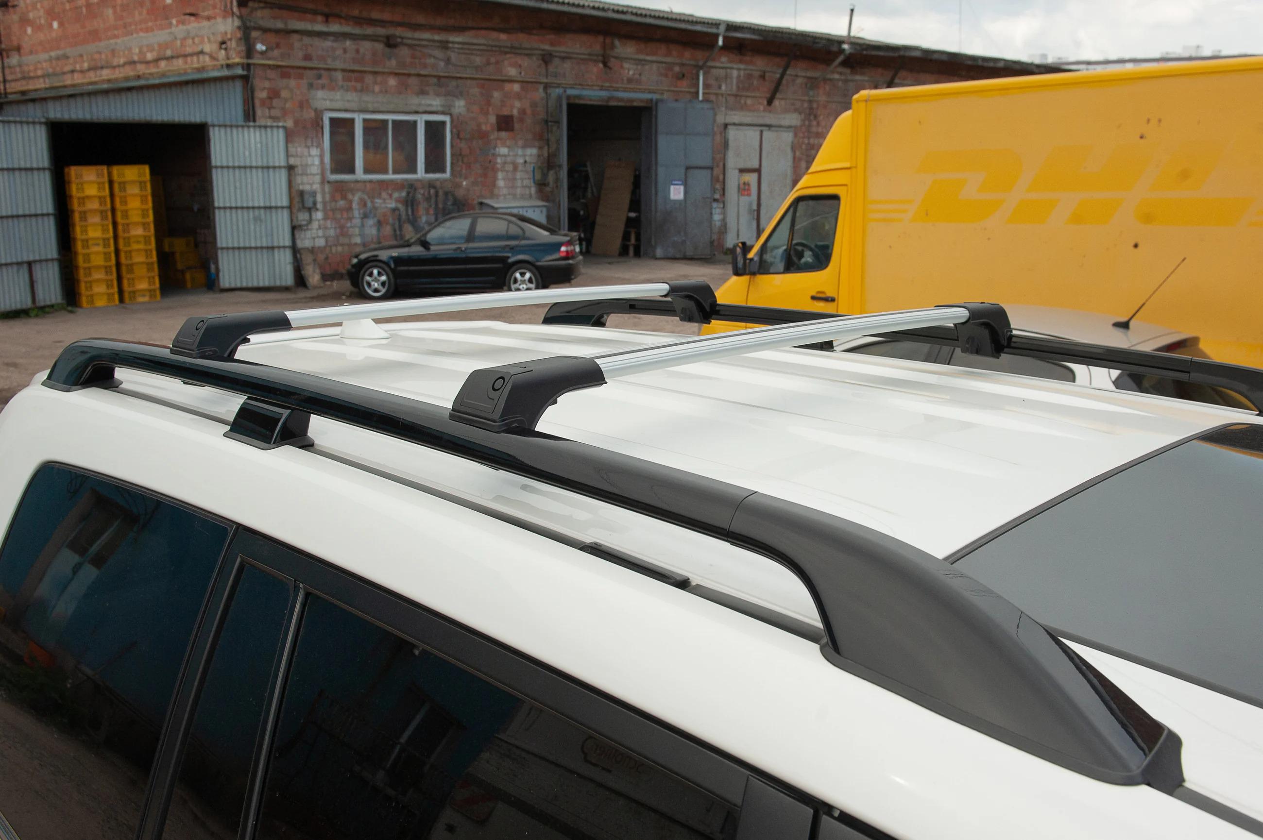 Багажник на обычные рейлинги без ключа Erkul Flybar V1 для SsangYong Musso II 2018-гг. алюминий/пластик до 110 см 2 шт. Серый (158820) - фото 4