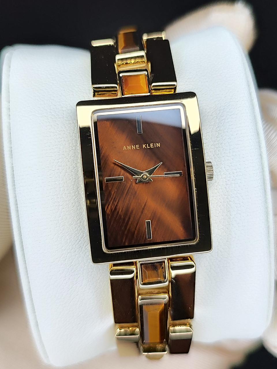 Наручные часы женские Anne Klein AK/4156TEGB с золотистым циферблатом и стальным браслетом