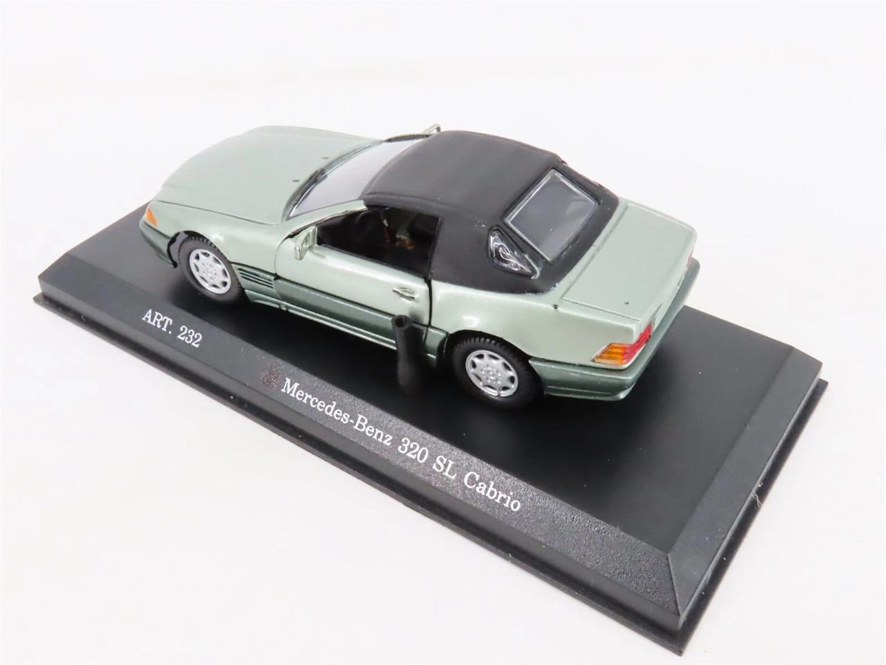 Игрушечная машинка Matchbox Collectibles 1:43 Mercedes 320 SL Soft Top 1990 s Detail Cars Titanium №232 (9DC-232) - фото 5 Игрушечная машинка Matchbox Collectibles 1:43 Mercedes 320 SL Soft Top 1990 s Detail Cars Titanium №232 (9DC-232) - фото 5