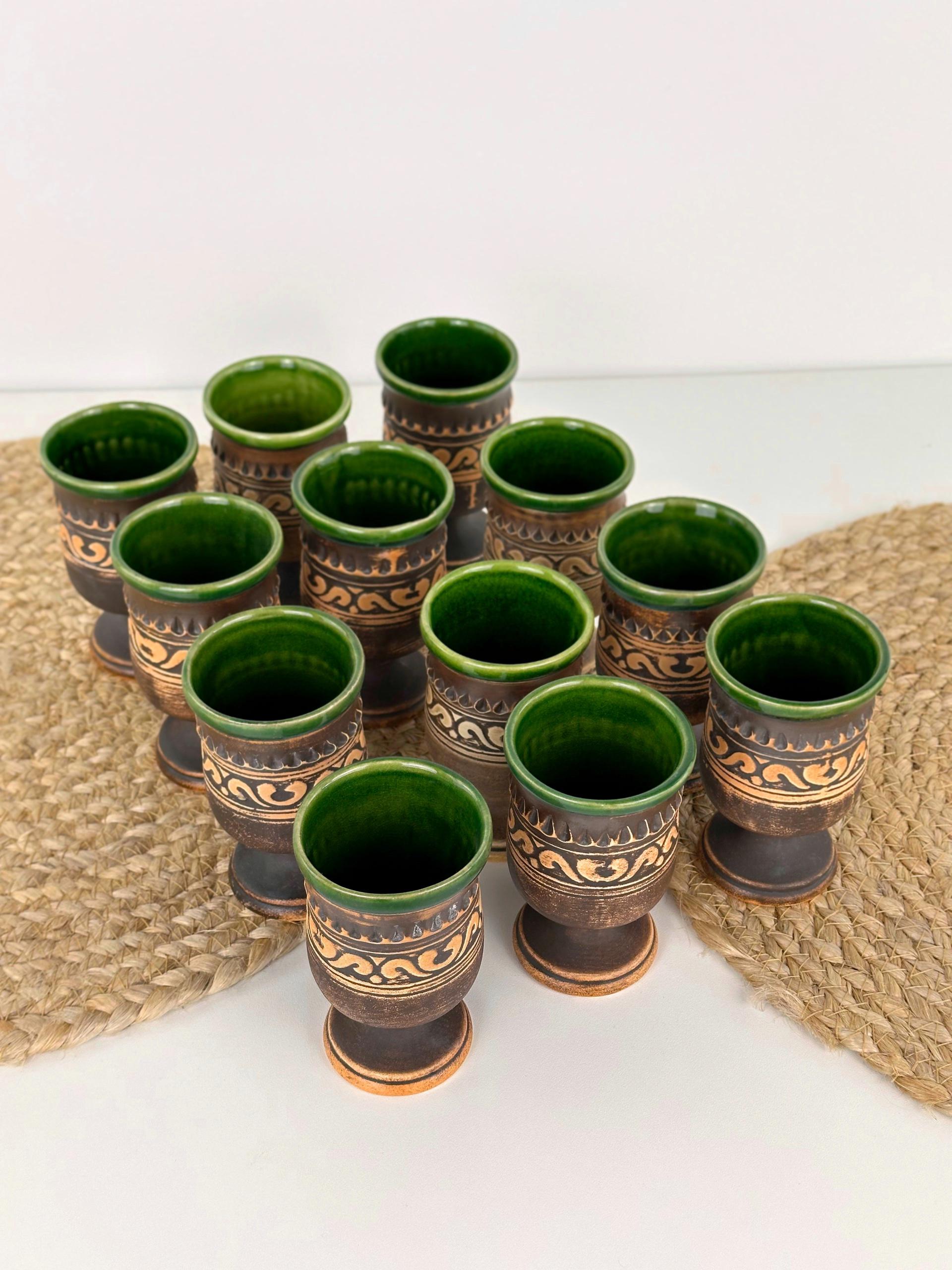 Набір глиняних келихів Гражда 0,1 л х 12 шт. Коричневий (17019-32) Набір глиняних келихів Гражда 0,1 л х 12 шт. Коричневий (17019-32)