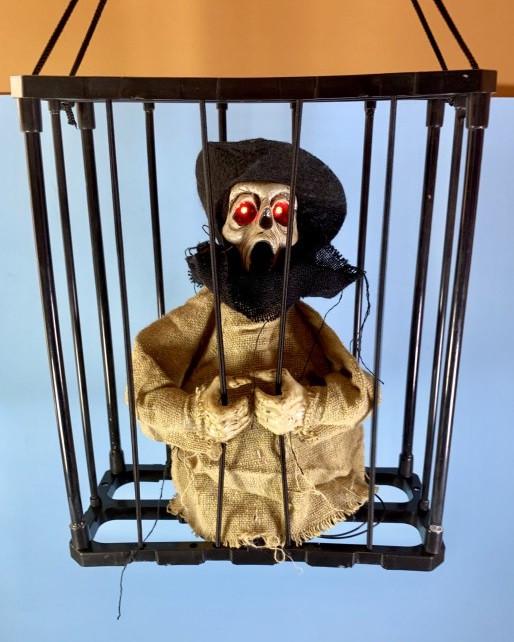 Підвісний декор на Хелловін Нежить в клітці зі звуком 28 см Жовтий