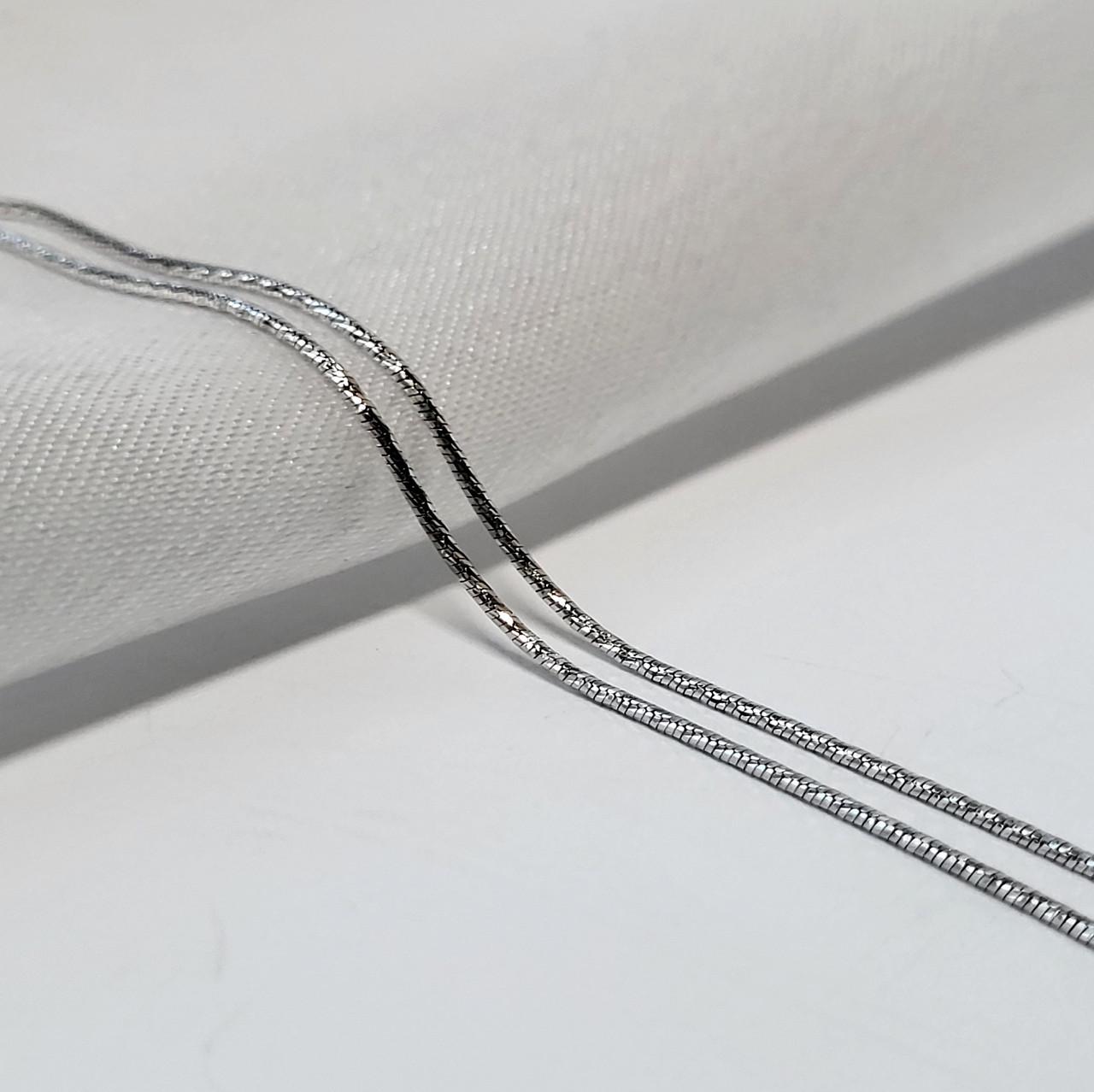 Цепочка тонкая круглая снейк с насечкой серебро 925 пробы родированное 2,50 г 55 см (871р2/55)