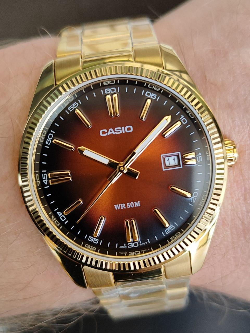 Наручные часы мужские Casio MTP-1302PGC-5A Timeless Collection Коричневый (2703667138)