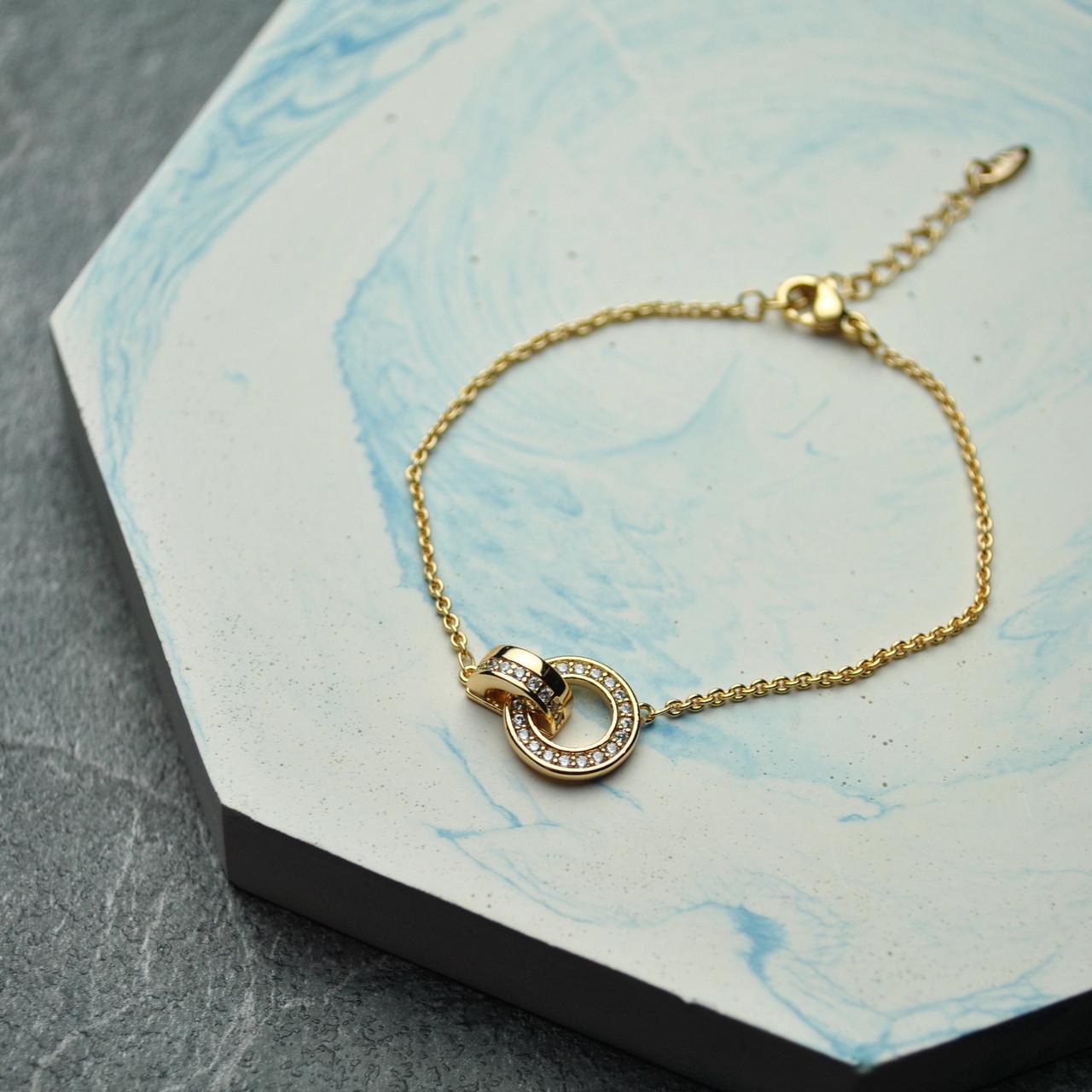 Браслет кольцо с фианитами медицинская сталь позолота (x147)