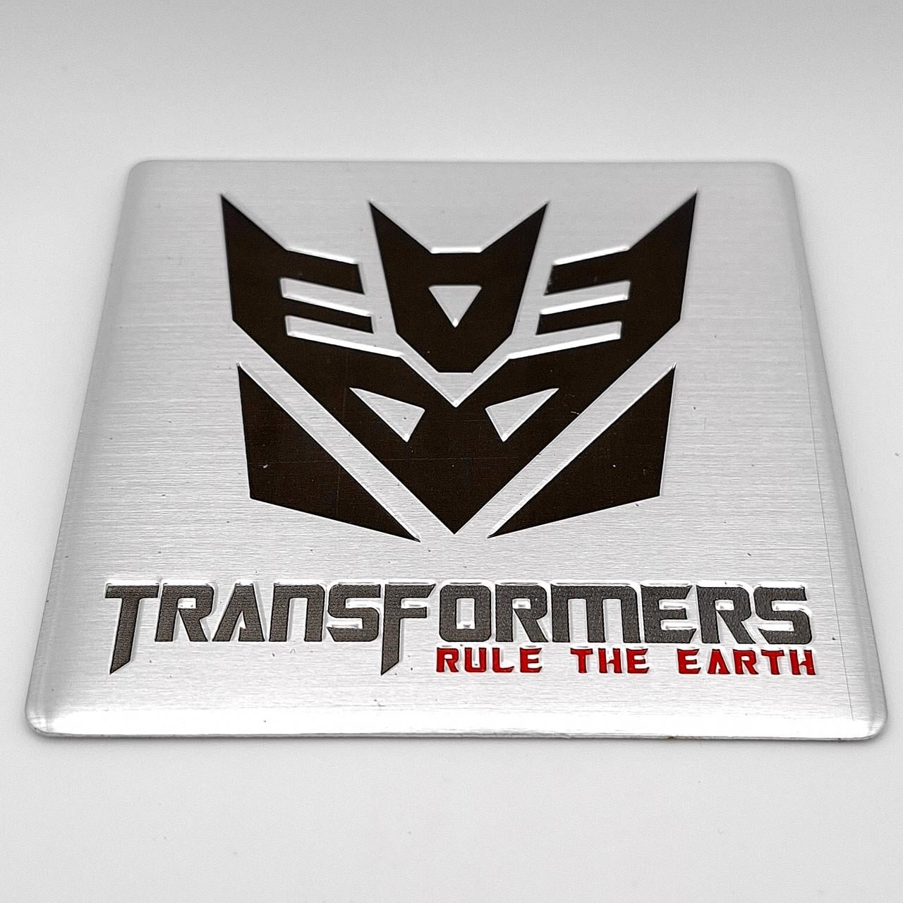 Эмблема алюминиевая Трансформеры Десептиконы Transformers Decepticons 8х8 см (2795754106)