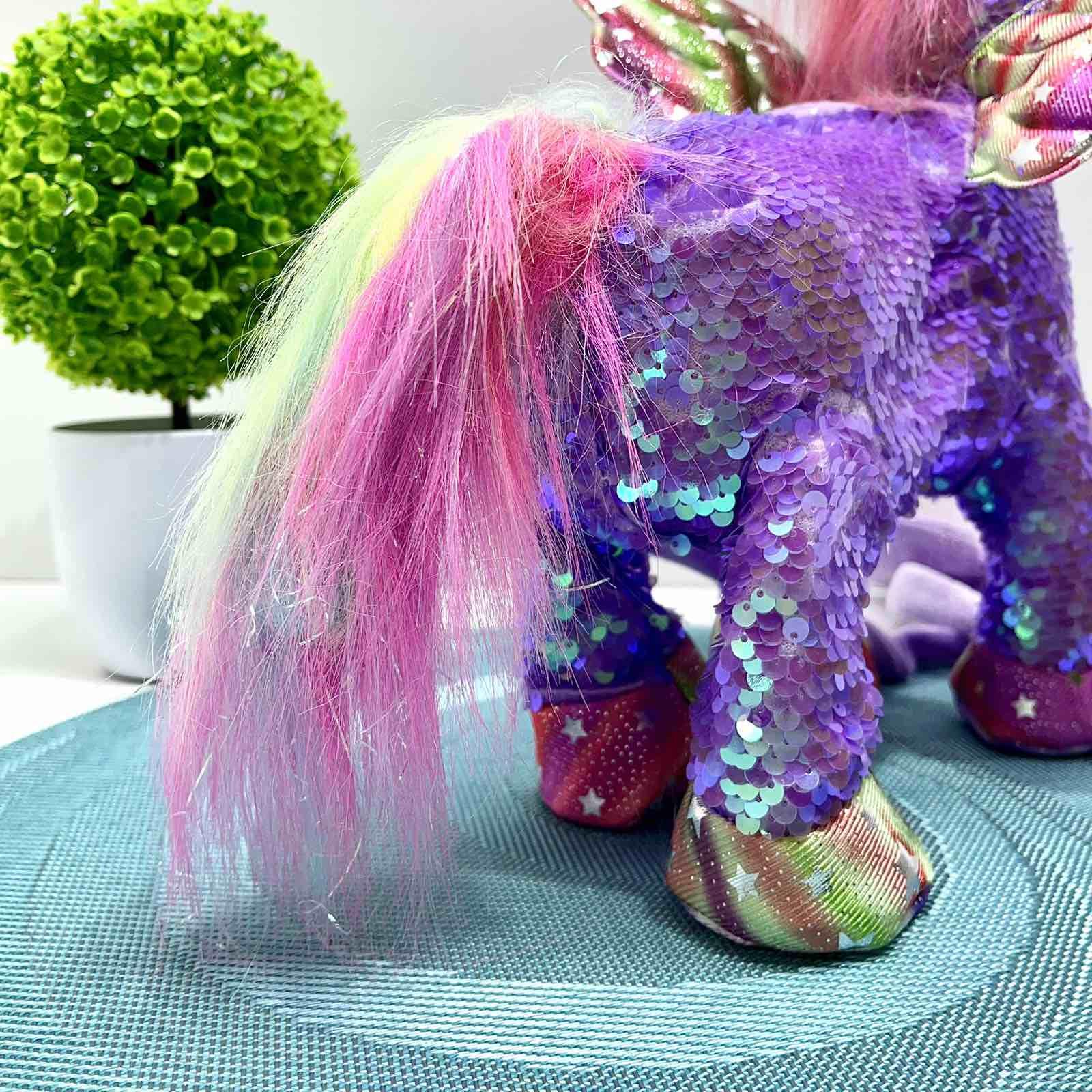 Интерактивная игрушка мягкая Сказочный единорог поводок/звук/свет Фиолетовый (M 6203 I UA) - фото 6 Интерактивная игрушка мягкая Сказочный единорог поводок/звук/свет Фиолетовый (M 6203 I UA) - фото 6