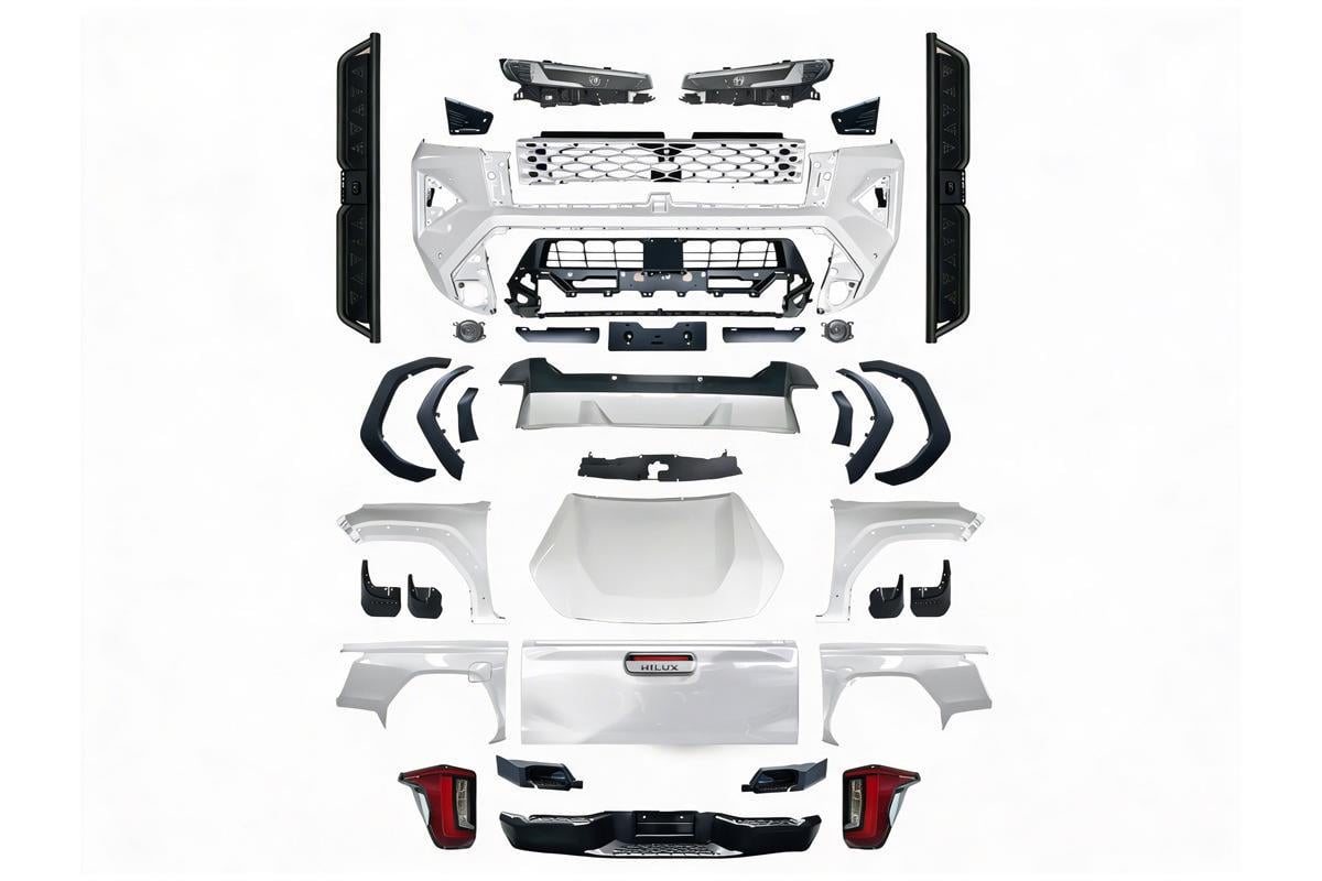 Комплект рестайлинга GBT в 2026 для Toyota Hilux 2015- гг. под покраску (189119) Комплект рестайлинга GBT в 2026 для Toyota Hilux 2015- гг. под покраску (189119)