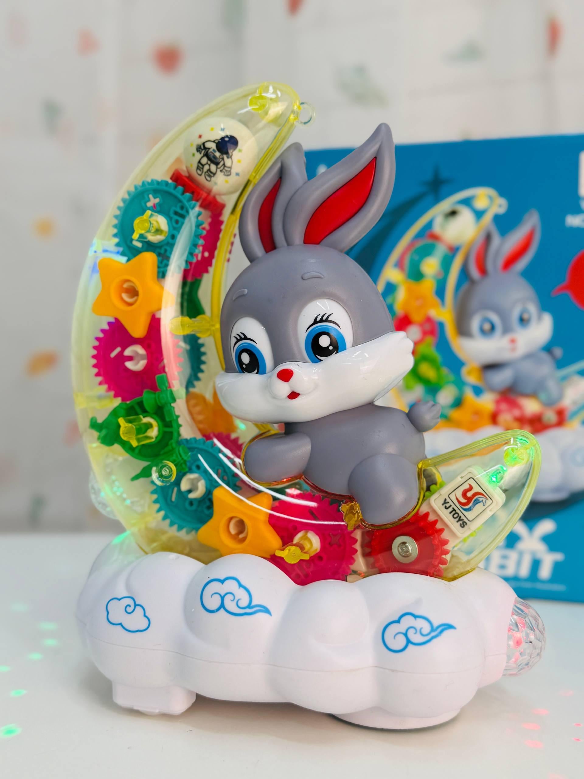 Игрушка музыкальная Зайка на месяце с подсветкой (2654) Игрушка музыкальная Зайка на месяце с подсветкой (2654)