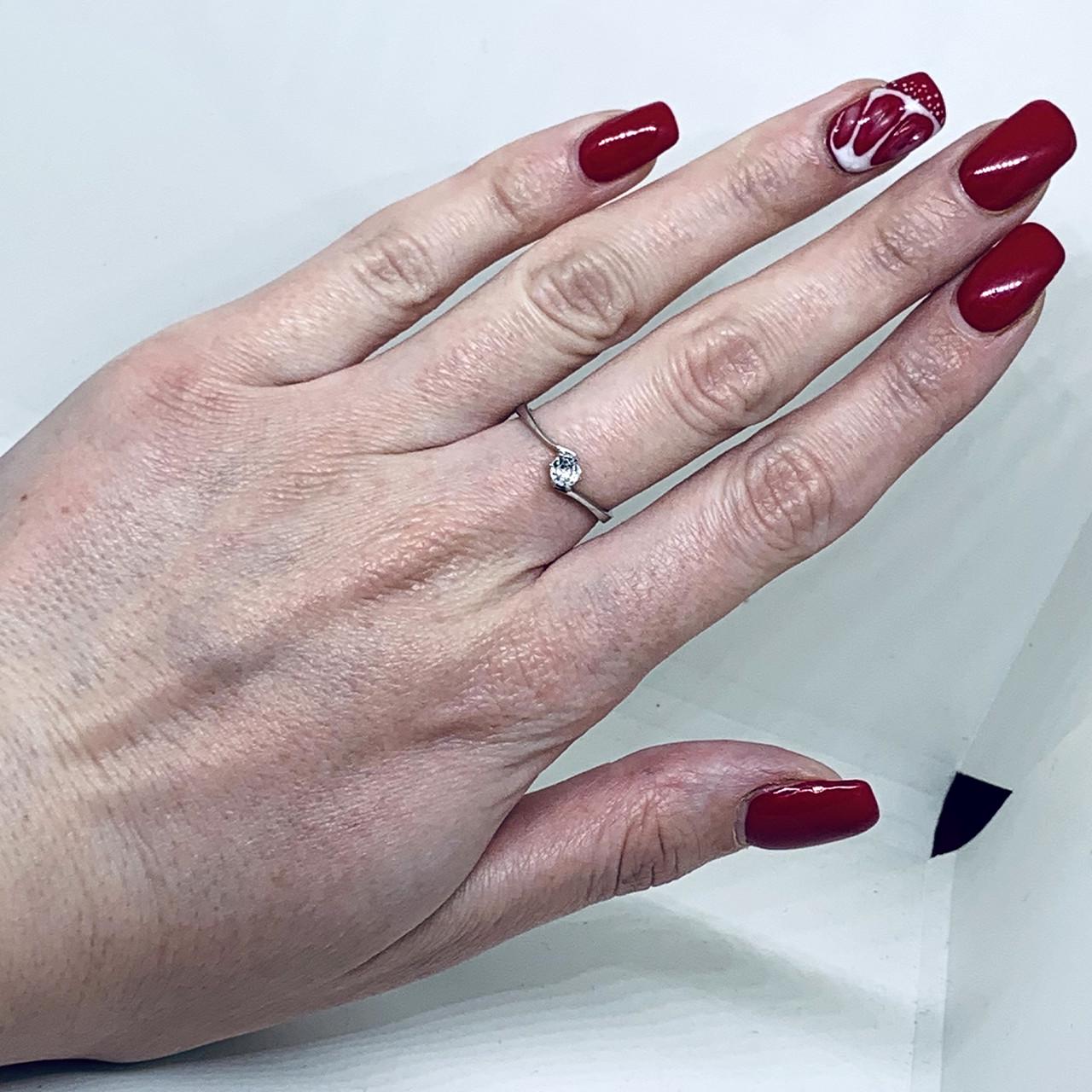 Кольцо серебряное с кубическим цирконием р. 18 1,12 г (1547216669)