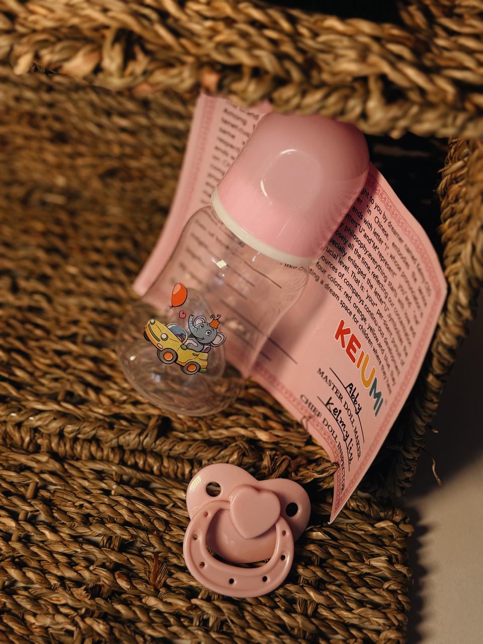 Кукла кукла реалистичная KEIUMI винил-силиконовая в вязаной кофточке с мишкой и аксессуарами 55 см - фото 7