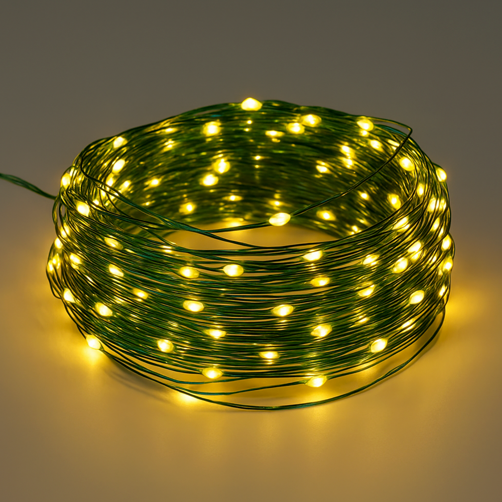 Гирлянда нить Роса 30 м с пульто м 300LED от USB зеленый провод теплый белый