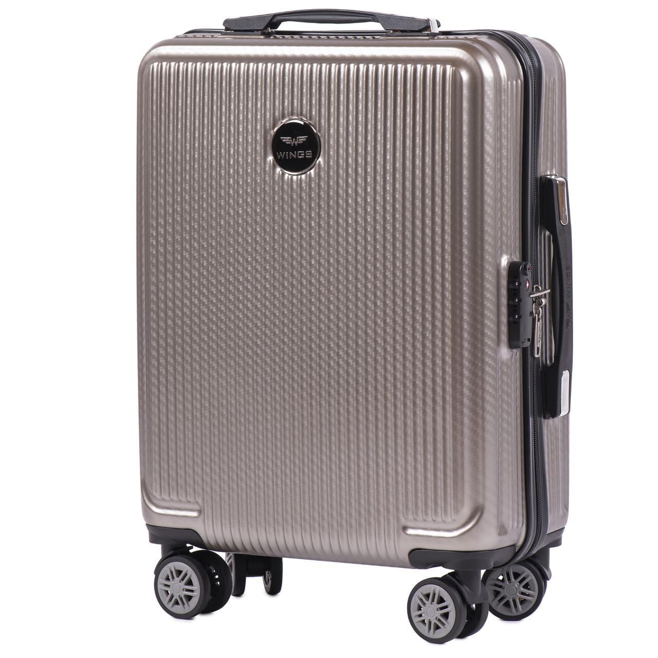 Чемодан Wings PC565 маленький под ручную кладь из поликарбоната на 4 сдвоенных колесах 35 л Бронза