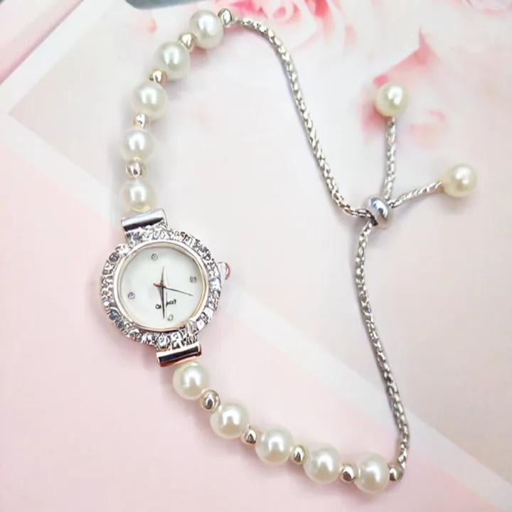 Наручний кварцовий годинник з регульованим браслетом із перлин та стразами Сріблястий (2690598356) - фото 5 Наручний кварцовий годинник з регульованим браслетом із перлин та стразами Сріблястий (2690598356) - фото 5