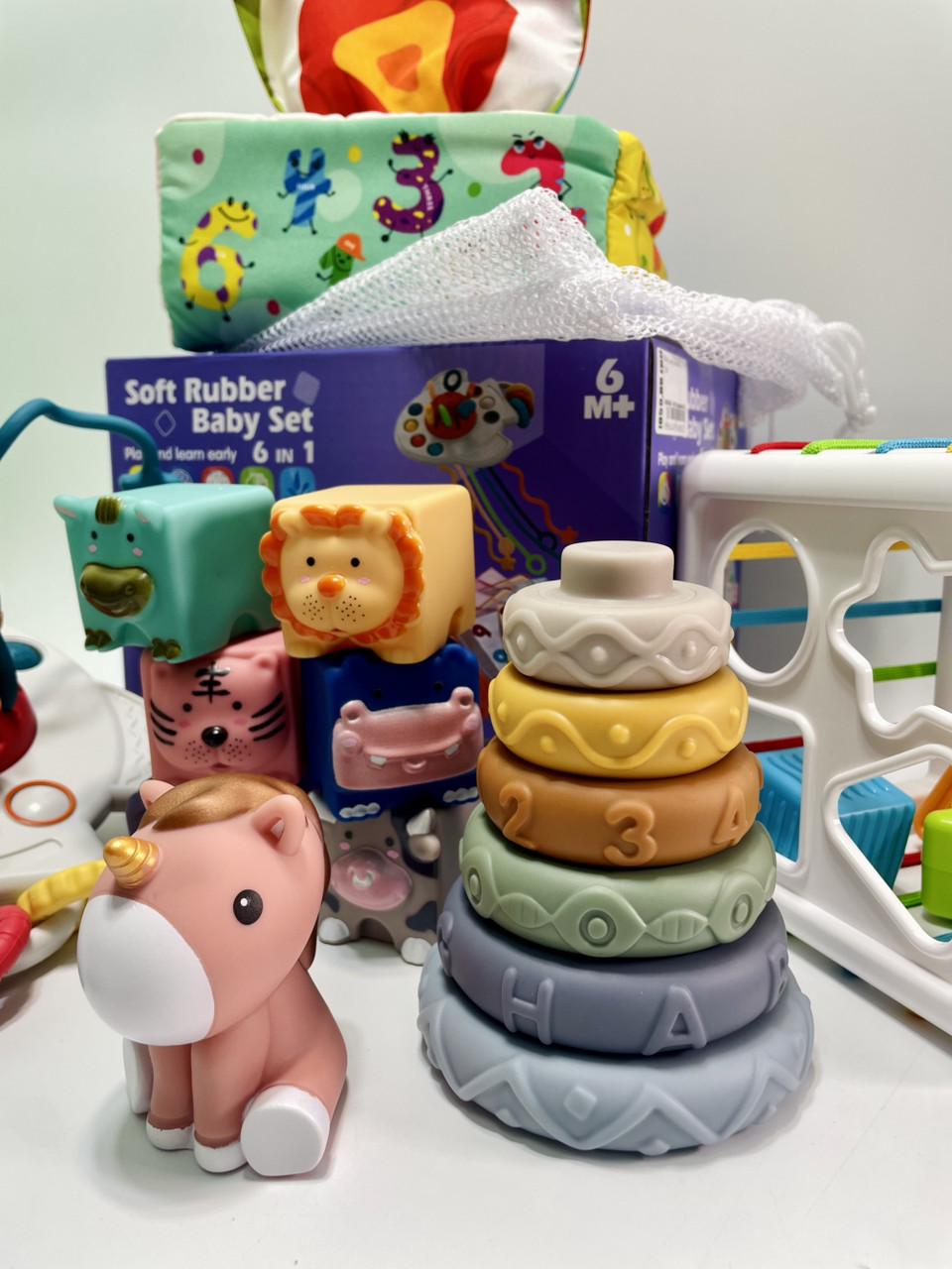 Набір для розвитку кубики/брязкальця/прорізувачі/фігурка пірамідка/серветки/мішечок/куб 34 елементи - фото 3 Набір для розвитку кубики/брязкальця/прорізувачі/фігурка пірамідка/серветки/мішечок/куб 34 елементи - фото 3