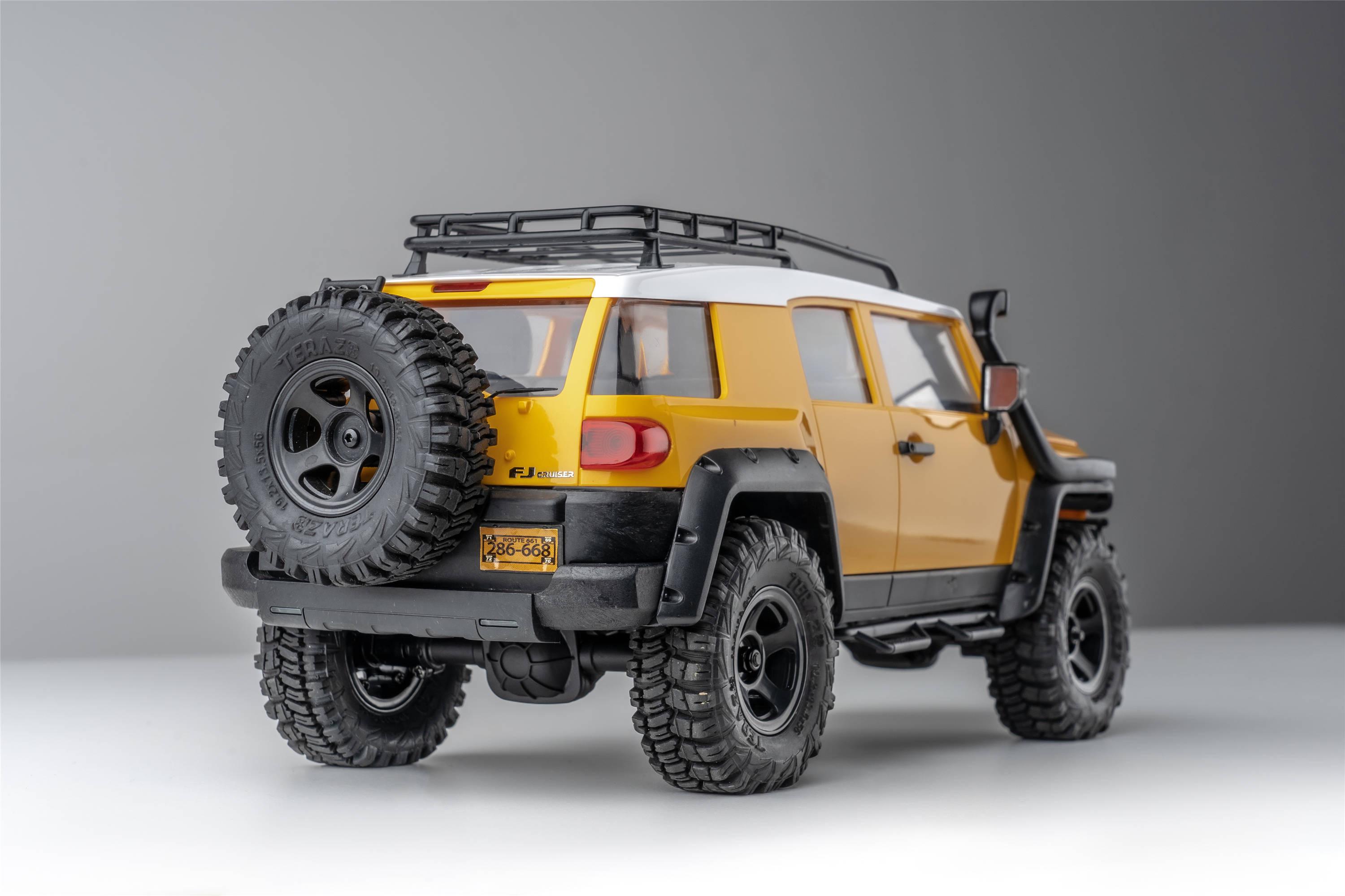 Машинка на радиоуправлении FMS 1:18 FJ Cruiser RTR Yellow - фото 31 Машинка на радиоуправлении FMS 1:18 FJ Cruiser RTR Yellow - фото 31