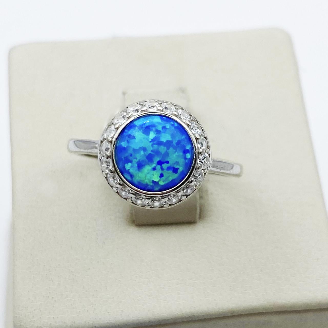 Кольцо серебряное с синим опалом р. 17,5 2,41 г (1898374112)