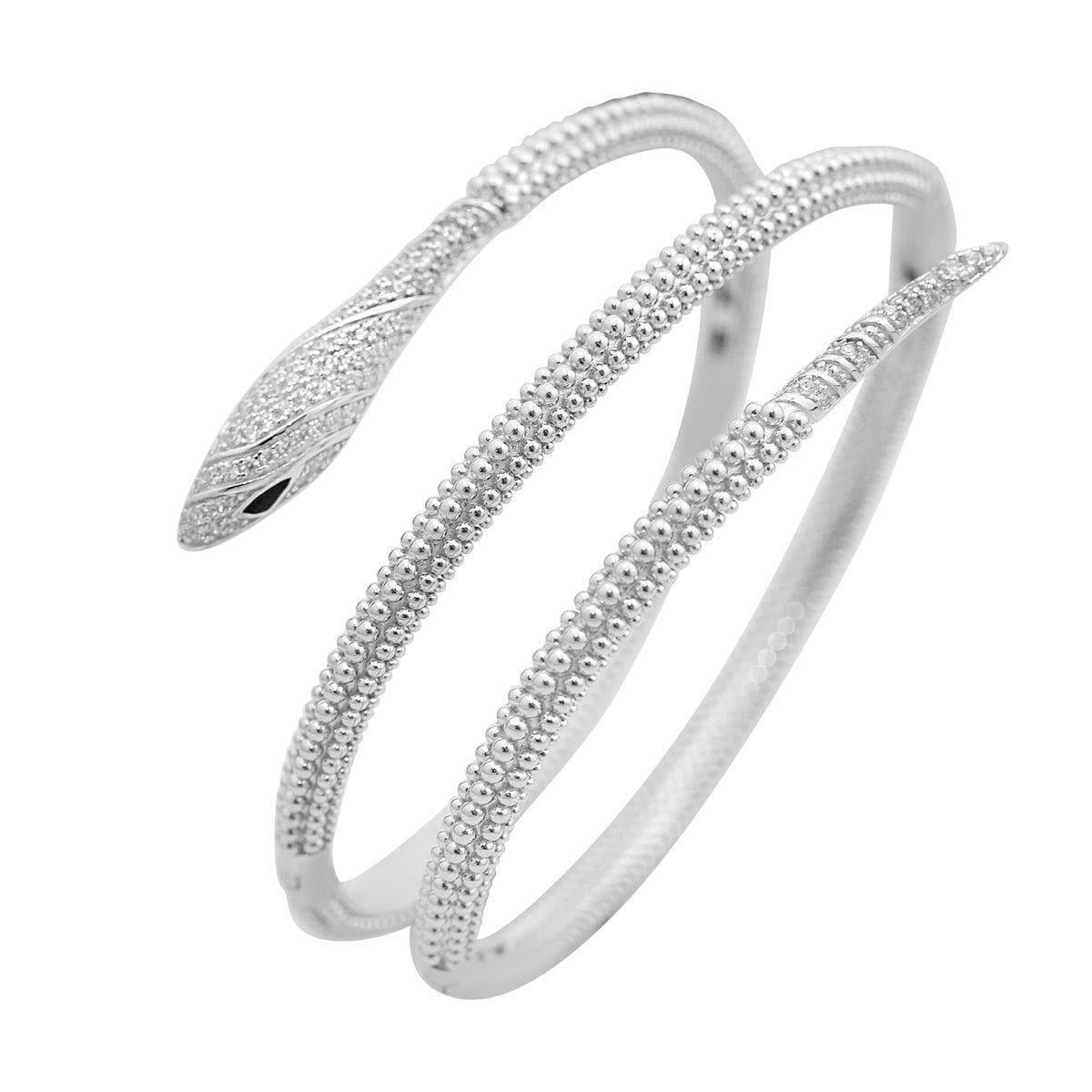 Браслет серебряный жесткий в форме змеи украшенный фианитами