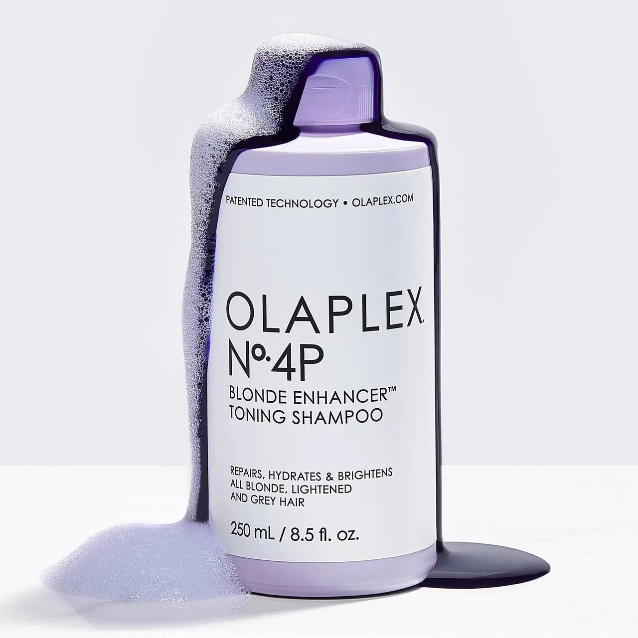 Шампунь тонувальний Olaplex No4P Магія блонду Blonde Enhancer Toning Shampoo з фіолетовим пігментом 250 мл - фото 4