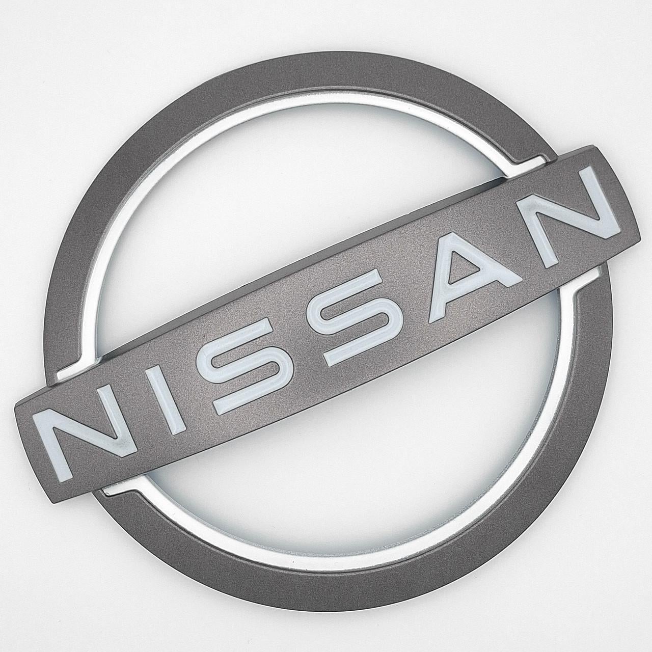Эмблема Nissan радиаторной решетки ABS Серый матовый 153х130 мм (62890 9VC0A)