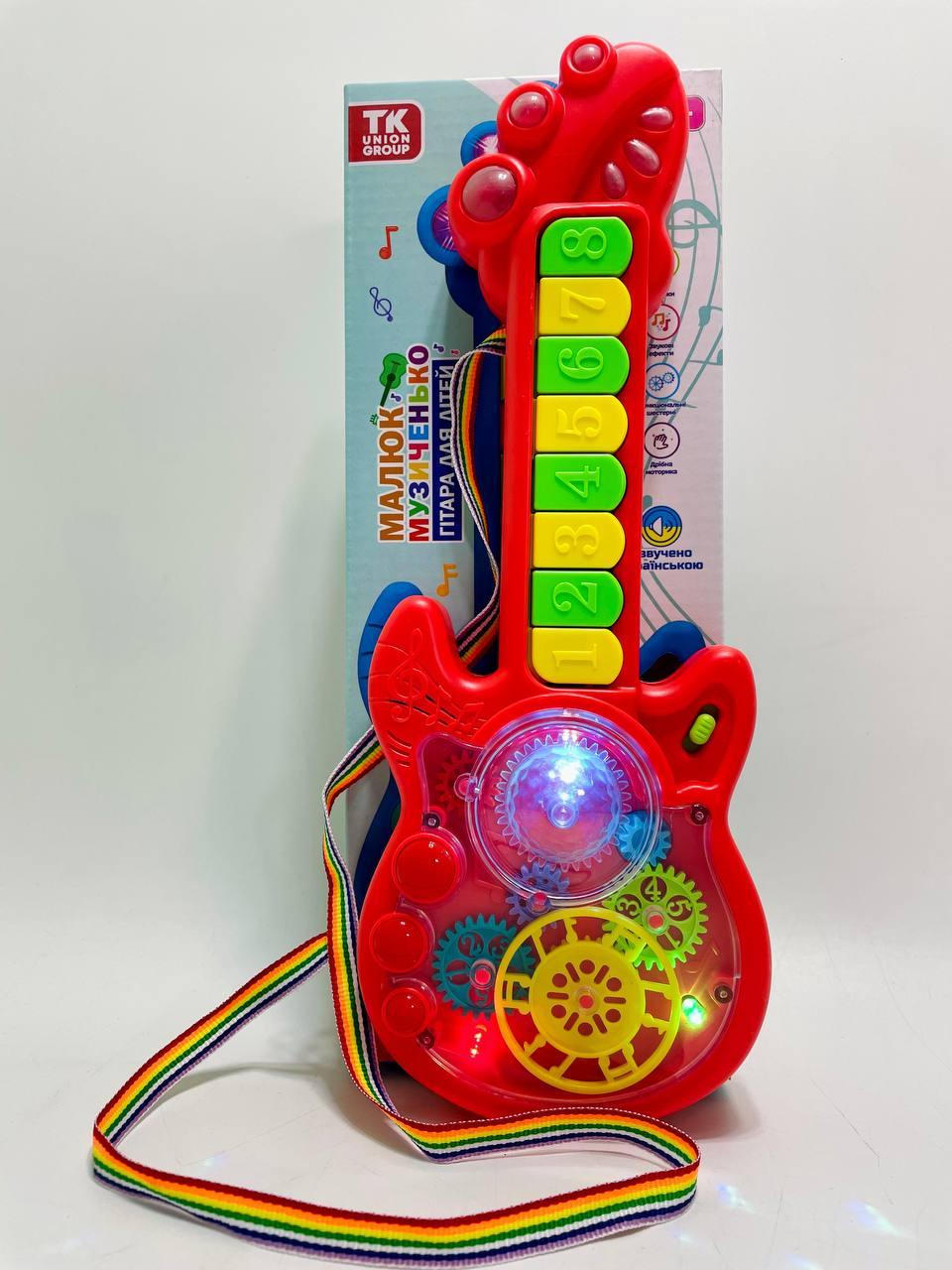 Гитара на батарейках TK Group 2 режима игры/8 песен/пианино/прозрачный корпус/подвижные шестерни Красный - фото 4 Гитара на батарейках TK Group 2 режима игры/8 песен/пианино/прозрачный корпус/подвижные шестерни Красный - фото 4