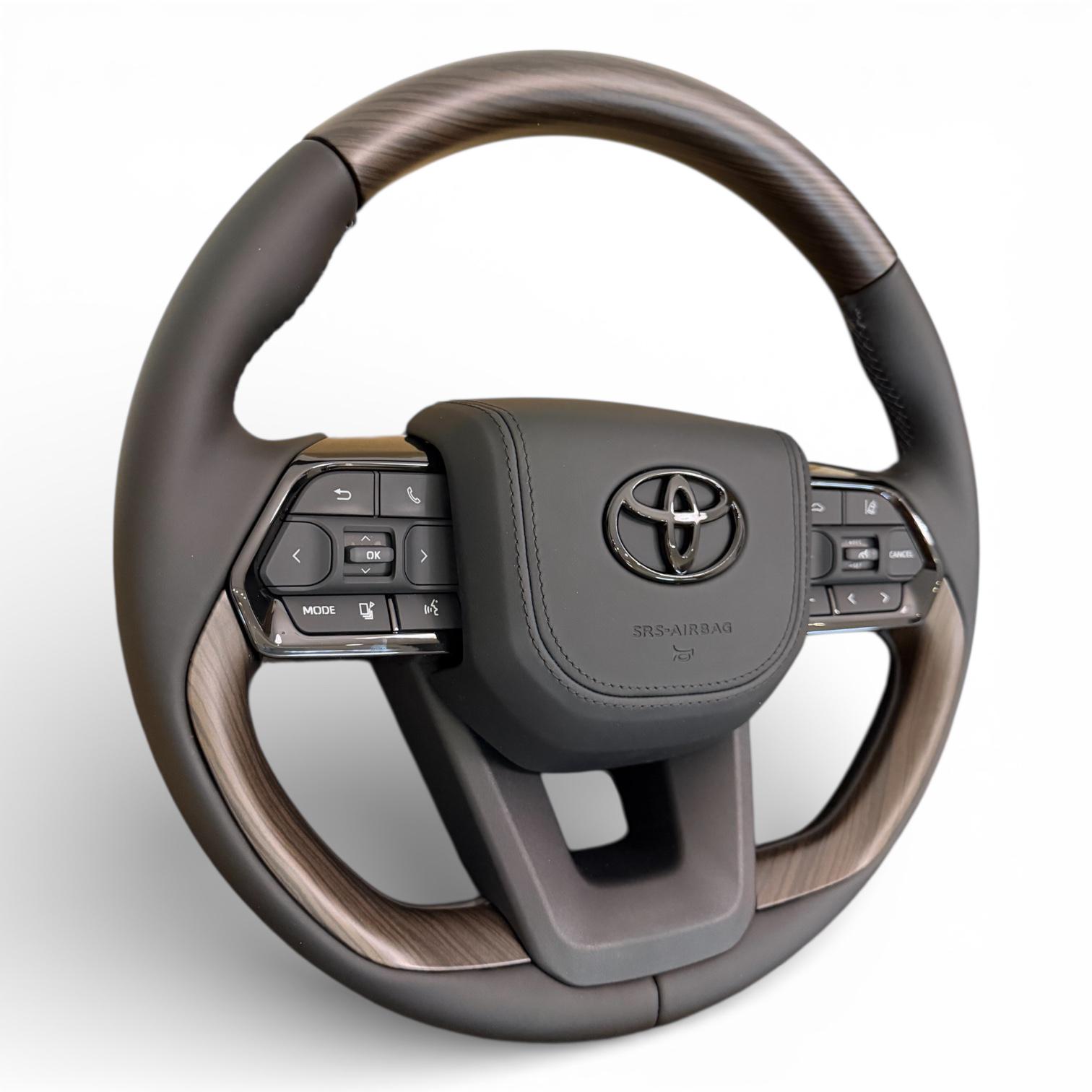 Руль для Toyota Land Cruiser 200/Prado 150 в стиле LC300 из кожи черный логотип в сборе Коричневое дерево (31195783)