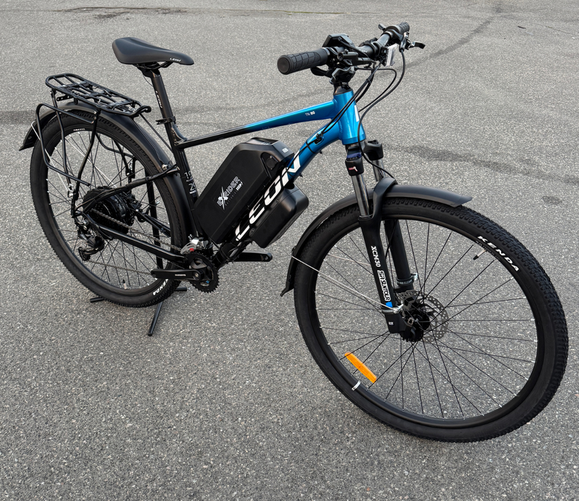 Велосипед с Е-комплектом с багажником Leon TN 80 HDD 2025 29" 48 В 1000 Вт MXSUS 21 Ah до 65 км запас хода дисплей LSD10 Pas-ассистент